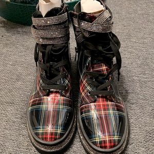 Never worn Size 10 Jessica Simpson plaid and rhinestone combat boot.